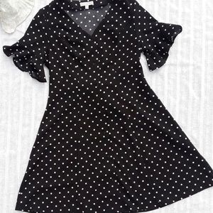 Black with white polka dots button up dress